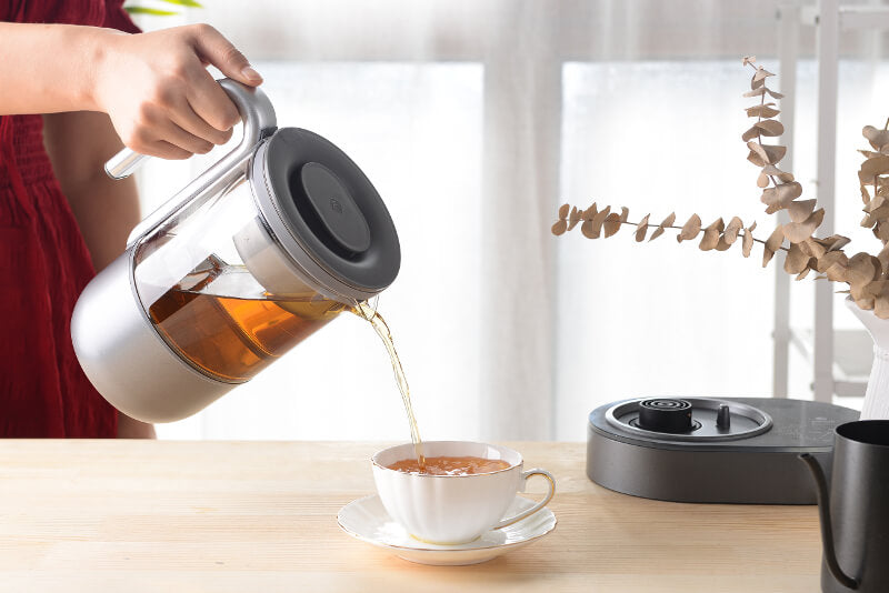 automatic tea maker pouring tea