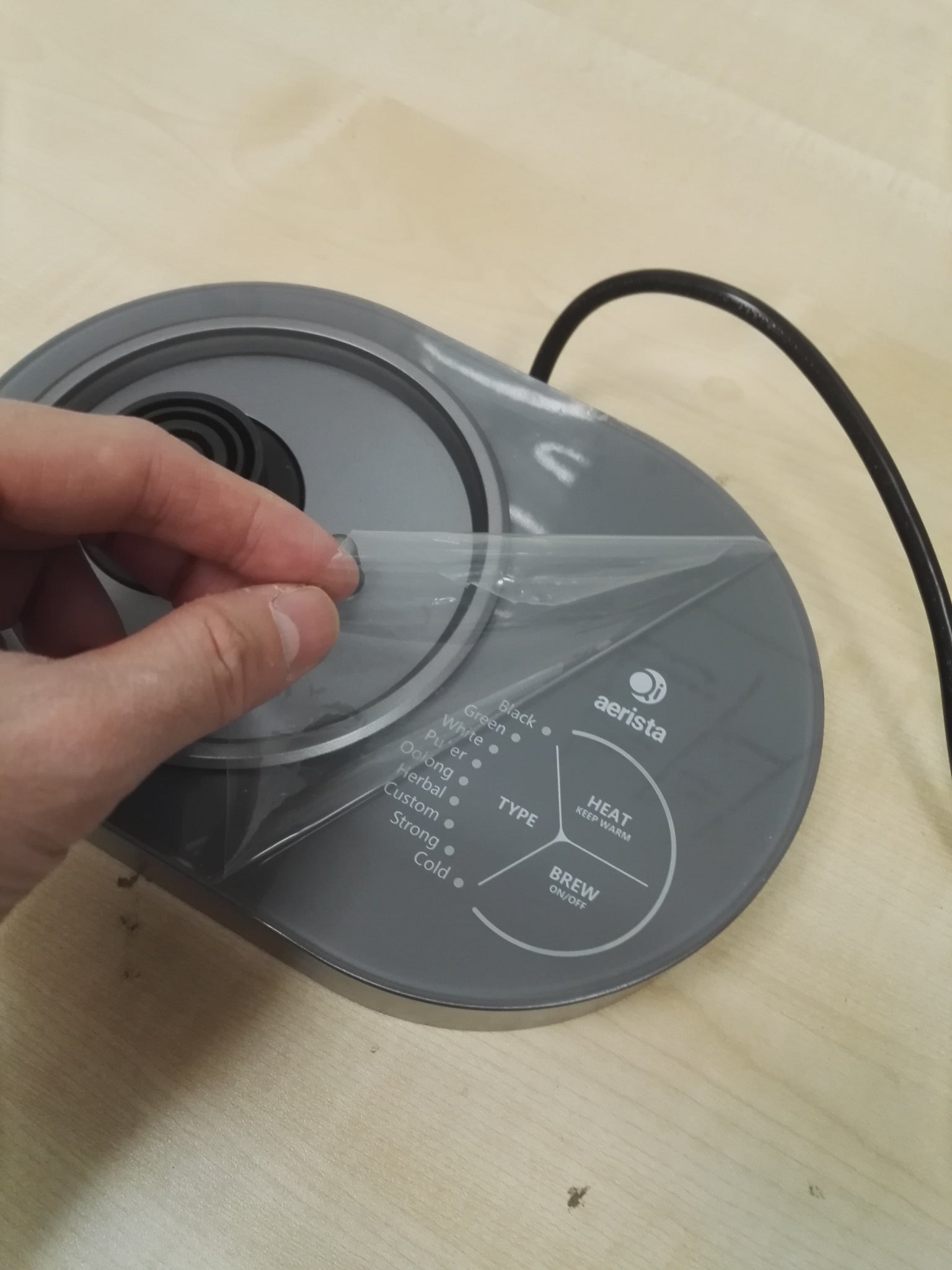 Removing the Top Protective Film of the Base