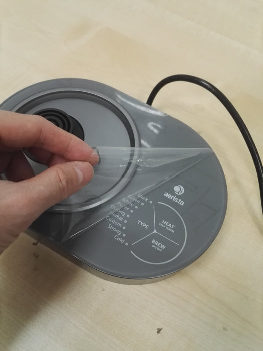 Removing the Top Protective Film of the Base